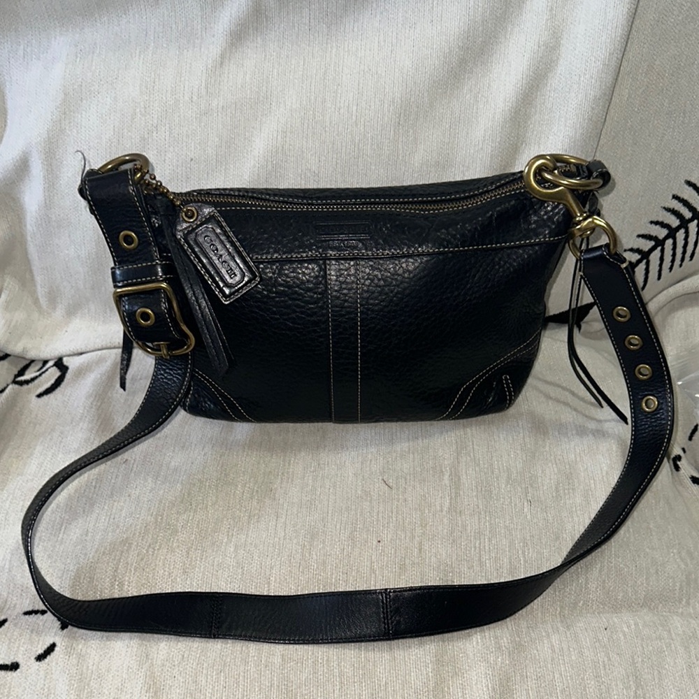 Coach Black Leather Crossbody Bag with gold hardware laced leather and buckles